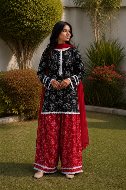 Black printed Pakistani shalwar suit with red traditional shalwar and chiffon dupatta for women by Noor by Nureh
