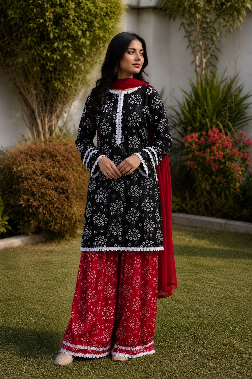 Black printed Pakistani shalwar suit with red traditional shalwar and chiffon dupatta for women by Noor by Nureh