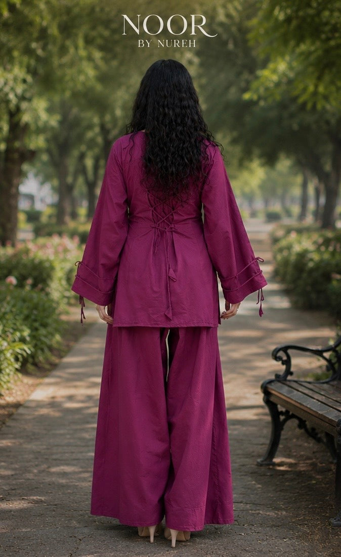Plum pink women’s co-ord set featuring statement sleeves and wide-leg palazzo pants by Noor By Nureh