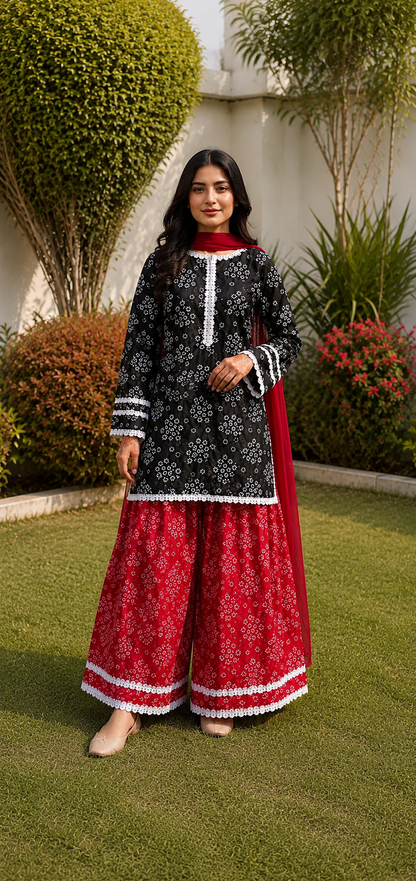Black printed Pakistani shalwar suit with red traditional shalwar and chiffon dupatta for women by Noor by Nureh