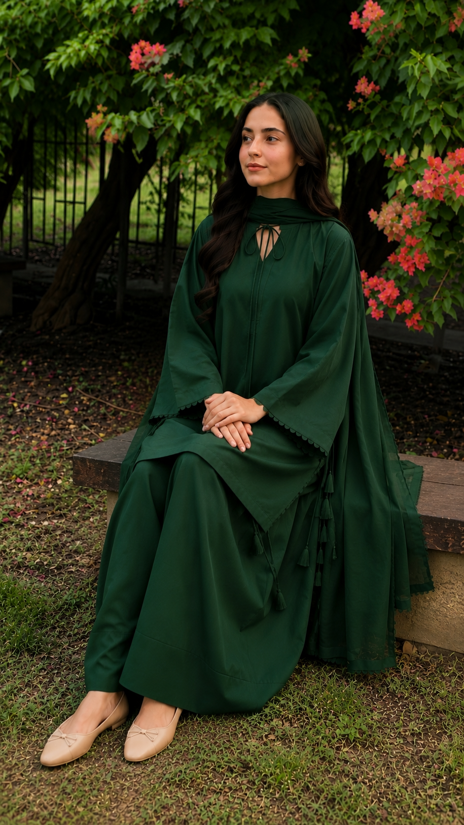Bottle green 2-piece Pakistani suit with long flowy shirt and wide-leg shalwar
